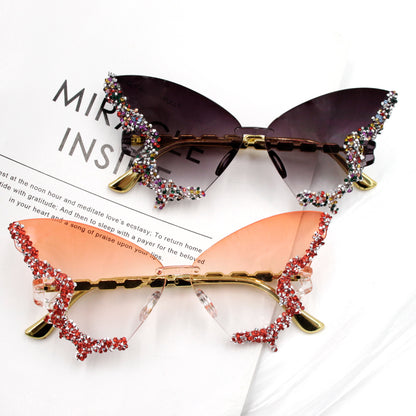 Novel diamond-encrusted butterfly-shaped sunglasses for women, fashionable and unique, bold frameless black sunglasses